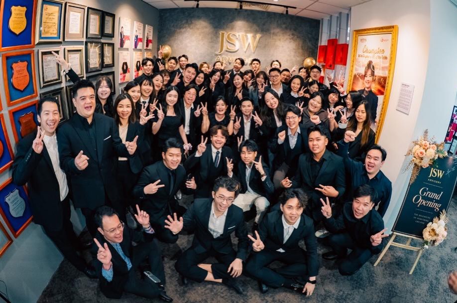 JSW team celebrating together at the office opening